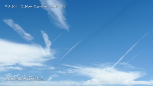 12:20pm Hemet - Four parallel aerosol spray planes.