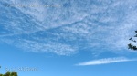 1/5/2012 San Diego 12:01pm - Parallel chemtrails with cloud cover forming.