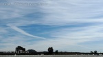 1/5/2012 San Diego 12:39pm - Massive expanding boomerang shaped chemtrail.