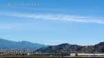 1/9/2012 Perris 11:18am - Another plane sprays a chemtrail across the expanded sine wave cloud.