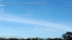 1/10/2012 Oceanside 3:13pm - Plane sprays chemtrail parallel to expanded chem cloud.