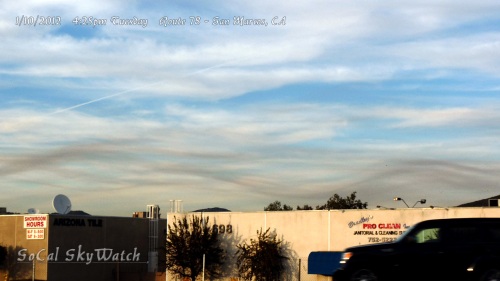 1/10/2012 San Marcos 4:25pm - Low altitude pollution haze sine wave formation under chemtrail cloudy skies.