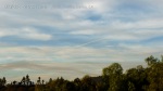 1/10/2012 San Marcos 4:27pm - Low altitude pollution haze sine wave formation under chemtrail cloudy skies.