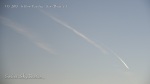6:51am A plane flies across one of two parallel chemtrail clouds and changes directions.